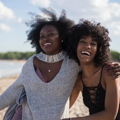Black women smiling
